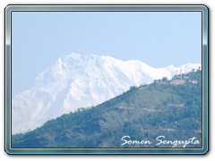 A small plane flying over Nepal Himalayas