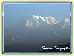 A small plane flying over Nepal Himalayas
