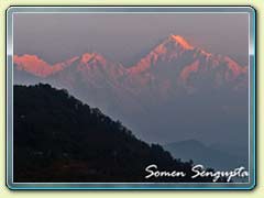 Golden Sun Rays over Kanchendzonga range as seen from Kolakham, Bengal