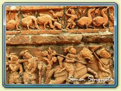 Terracotta works on the walls of temple at Diknagar
